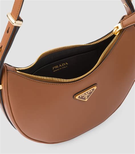 brown prada over the shoulder|prada arque shoulder bag.